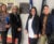 Four people pose in front of Senator John Cornyn's office in DC.