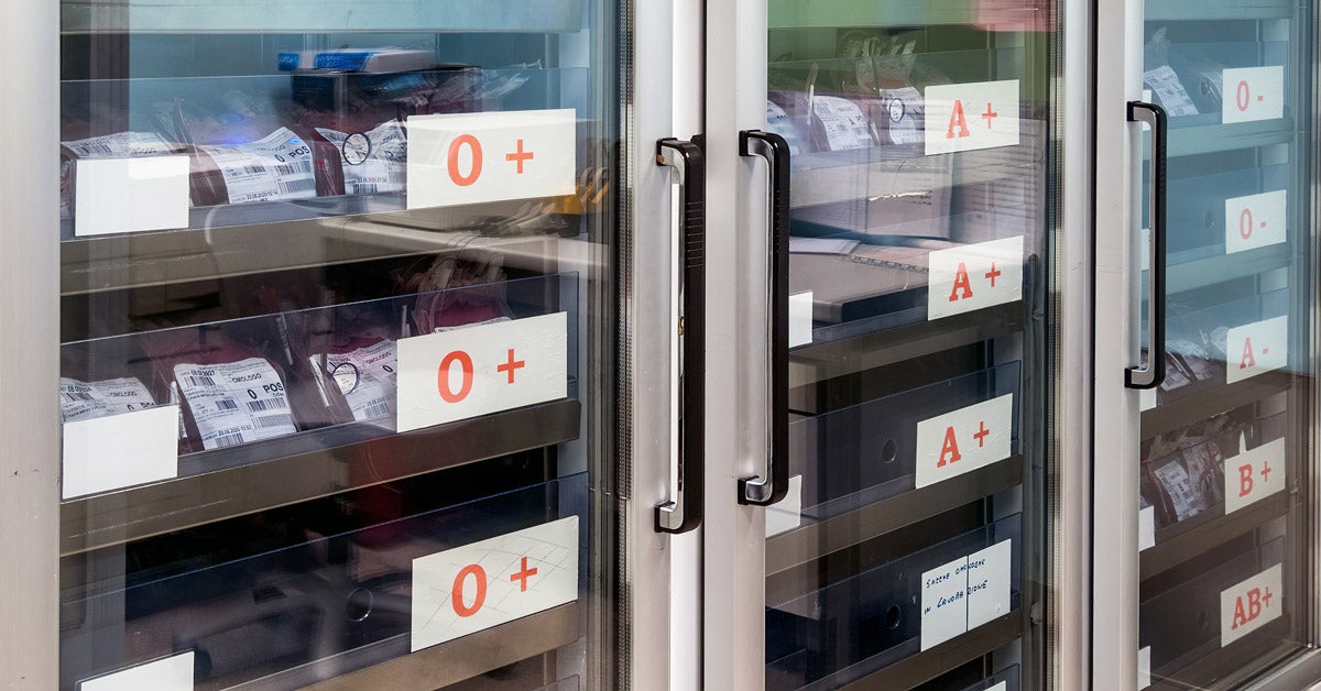 Refrigerated blood storage with shelves indicating blood type