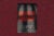 Book cover: "Death in Custody: How America Ignores the Truth and What we Can Do about it." By Roger A Mitchell Jr MD and Jay D Aronson, PHD. The book cover is of jail cell bar shadows and the text is in bright red. The cover is on a red speckled background.