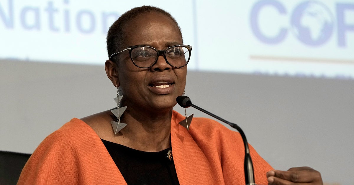 Wanjira Mathai, Vice President and Regional Director for Africa, World Resources Institute, sits on a panel and speaks into a microphone.